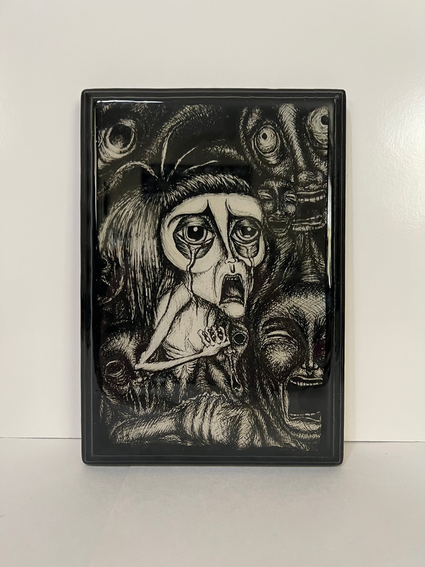 Despair Plaque